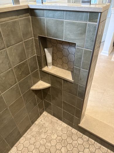 Shower niche detail in a remodeled master bath, RDH Construction