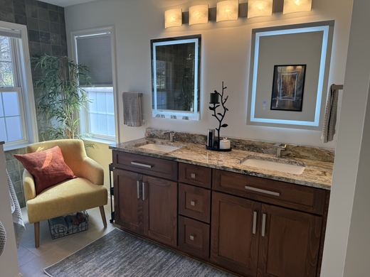 Master bath double vanity with lighted mirrors, remodel by RDH Construction