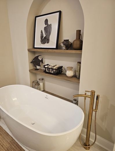 Freestanding tub with floor-mounted faucet, bathroom remodel by RDH Construction