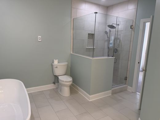 Glass shower and toilet area in a remodeled master bath, RDH Construction