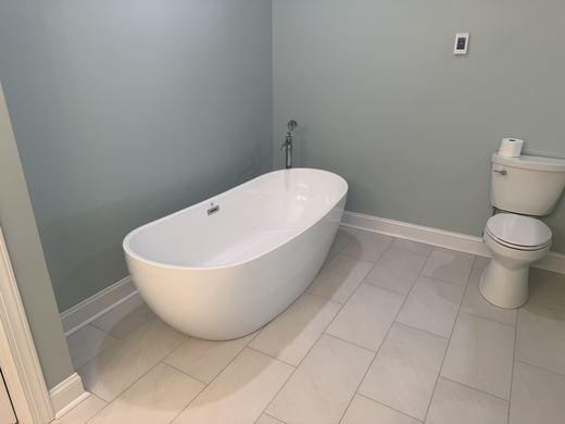 Freestanding tub, master bath remodel by RDH Construction