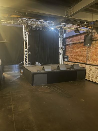 Stage with lighting truss, commercial project by RDH Construction